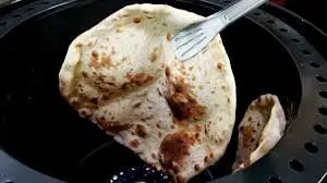 الخبز في تنور الطين في المنام